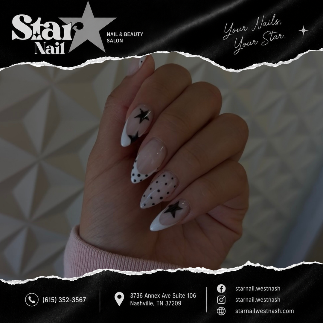 Almond French tip nails with black star and polka dot nail art at Star Nail West Nashville